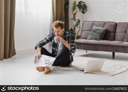 man planning redecorating home