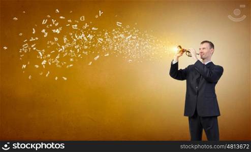 Man play flute. Young businessman in black suit playing flute
