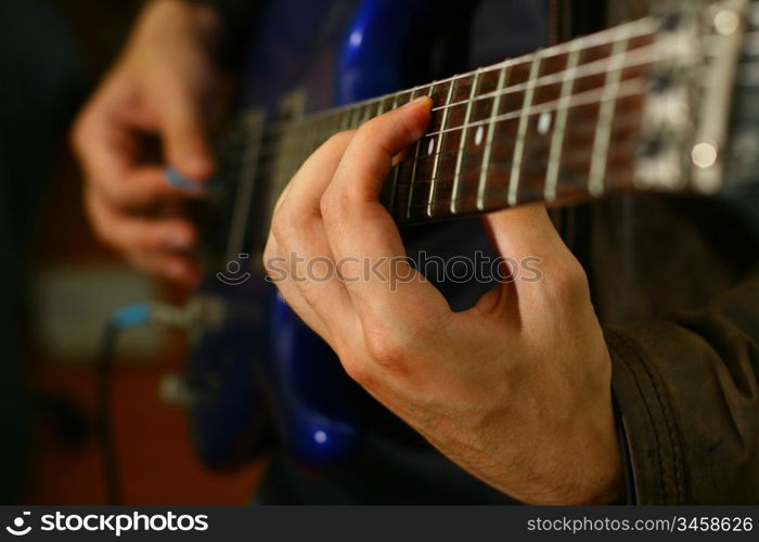 man play solo on blue guitar