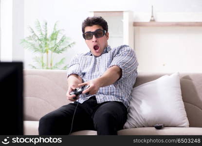 Man playing 3d games at home