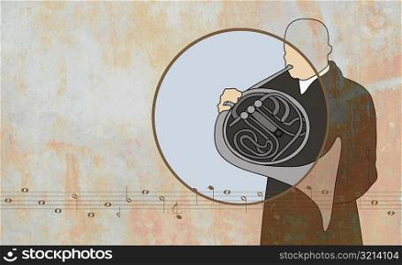 Man playing a French horn