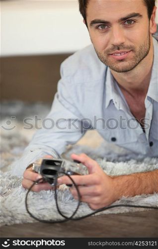 Man playing game on console