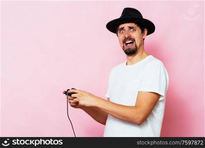 Man playing on the joystick in a game console
