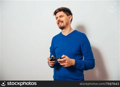 Man playing on the joystick in a game console
