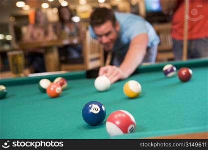 Man playing pool