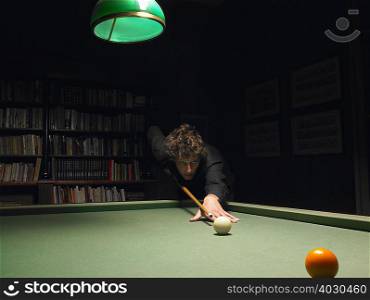 Man playing snooker