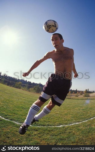 Man Playing Soccer