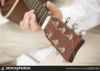 Man playing the guitar