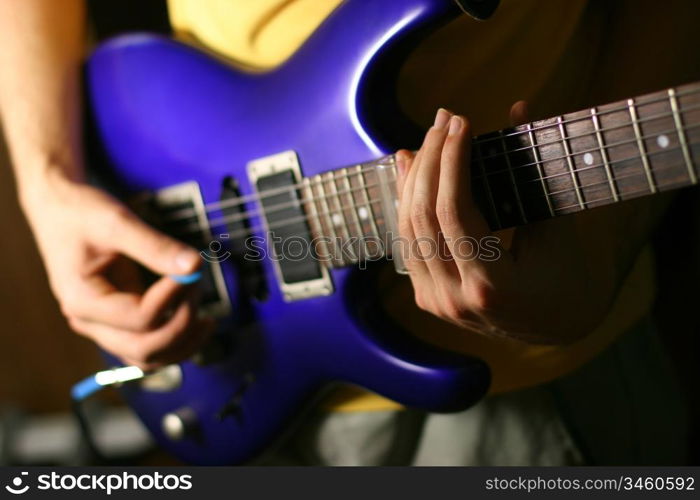 Man playing the guitar