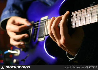 Man playing the guitar