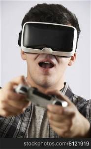 Man Playing Video Game Wearing Virtual Reality Headset