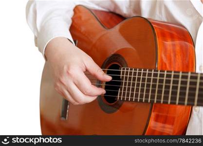 man plays on typical acoustic guitar close up isolated on white background