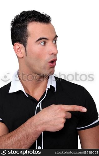 Man pointing in surprise