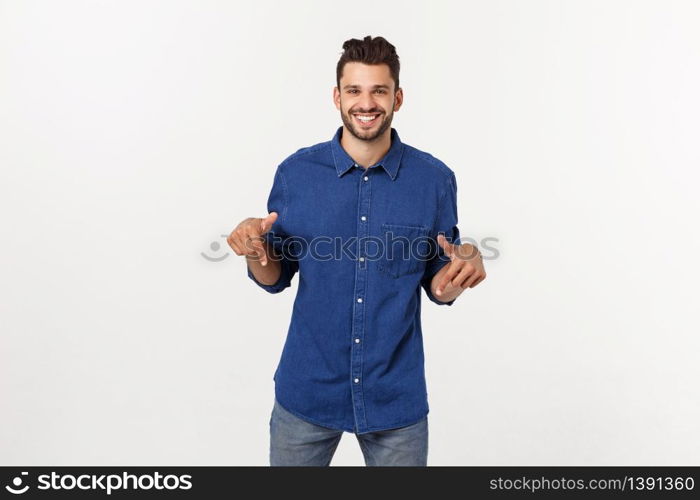 Man pointing showing copy space isolated on white background. Casual handsome Caucasian young man. Man pointing showing copy space isolated on white background. Casual handsome Caucasian young man.