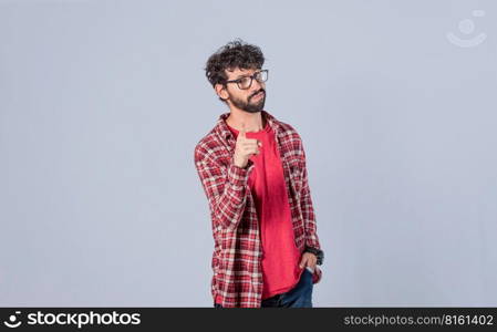 man pointing to the front with his finger, serious man pointing to the front on isolated background, a guy threatening with his finger