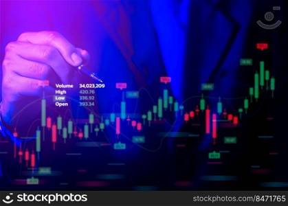 Man pointing with hand at graph of stock market financial exchange statistics and business chart of digital metaverse technology with growth economy concept.