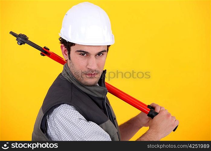 Man posing with bolt-cutters