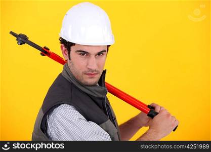 Man posing with bolt-cutters
