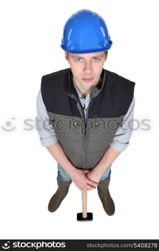 Man posing with sledge hammer