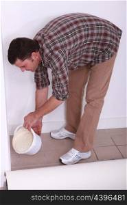 Man pouring plaster