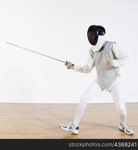 Man practicing fencing