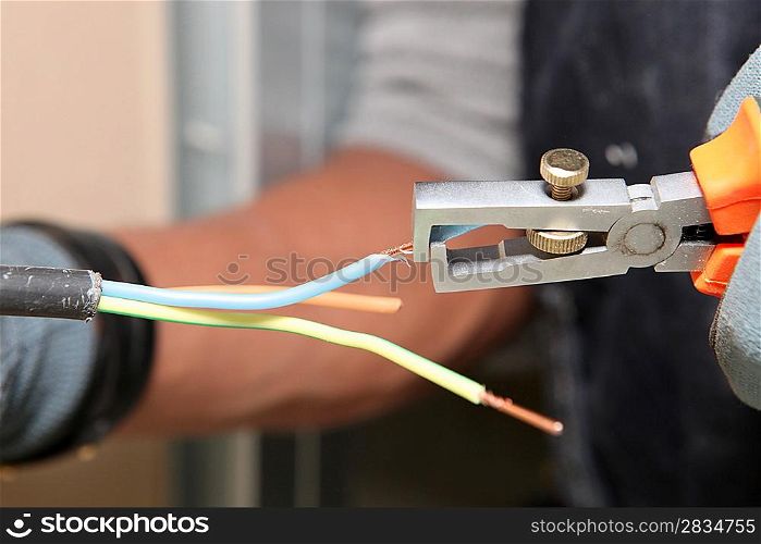 Man preparing electrical wire