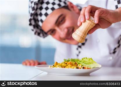 Man preparing food at the kitchen