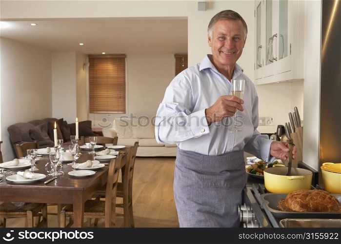 Man Preparing Food For A Dinner Party