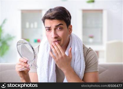 Man preparing to shave at home