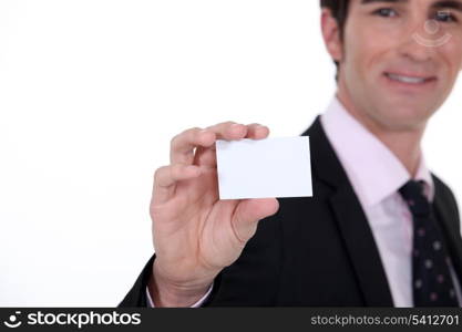 Man presenting business card