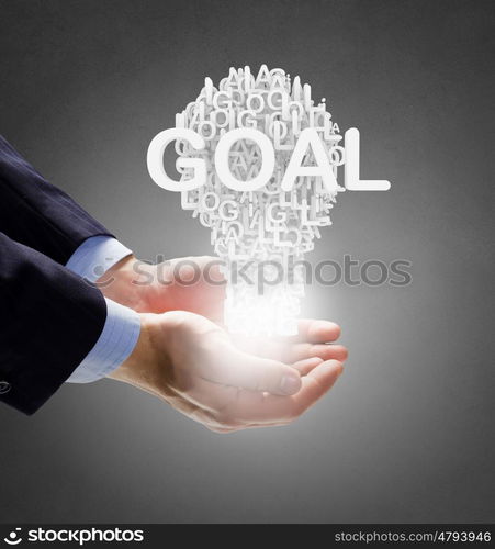 Man presenting idea. Businessman holding in hands successful idea concept