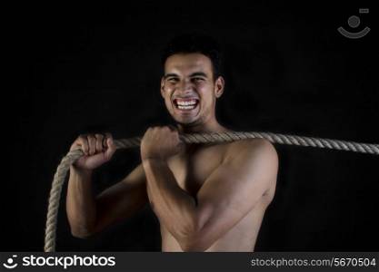Man pulling a rope