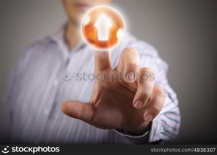 Man pushing icon. Close up of businessman touching icon on media screen