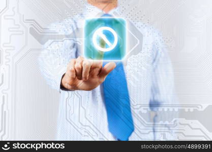 Man pushing icon. Close up of businessman touching icon on media screen