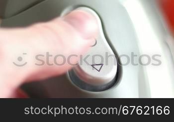 man pushing the button