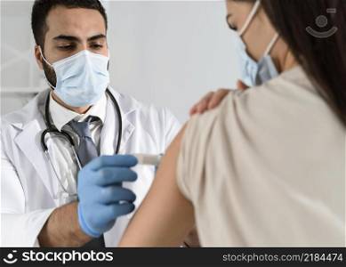 man putting bandage patient s arm