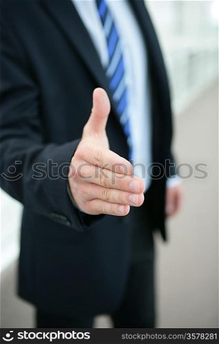 Man reaching out to shake hands
