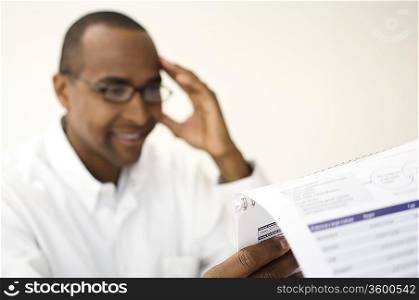 Man Reading a Document