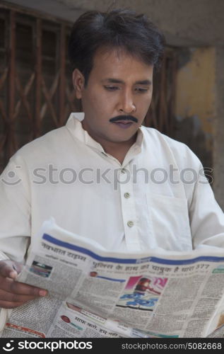 Man reading a newspaper