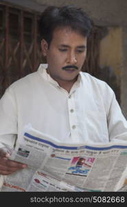 Man reading a newspaper