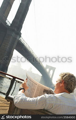 Man Reading Newspaper