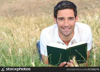 Man reading outside