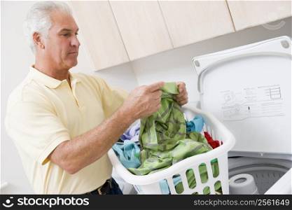 Man Reading Washing Instructions