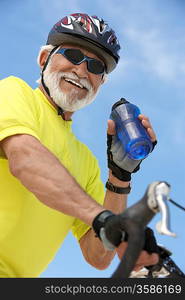 Man Refreshing After a Bicycle Ride