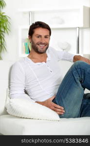 Man relaxing at home