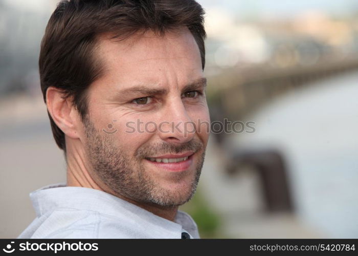 Man relaxing by the river.