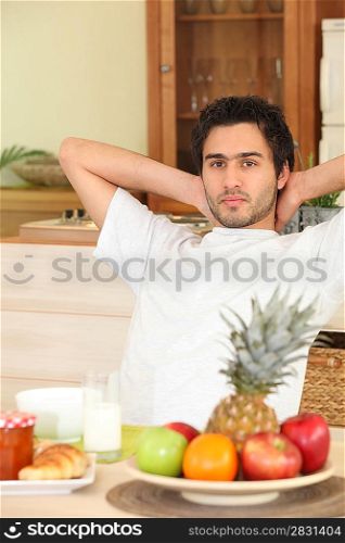 Man relaxing in kitchen
