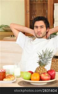 Man relaxing in kitchen