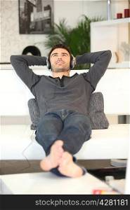 Man relaxing on a sofa
