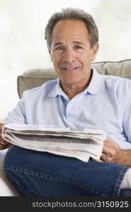 Man relaxing with a newspaper